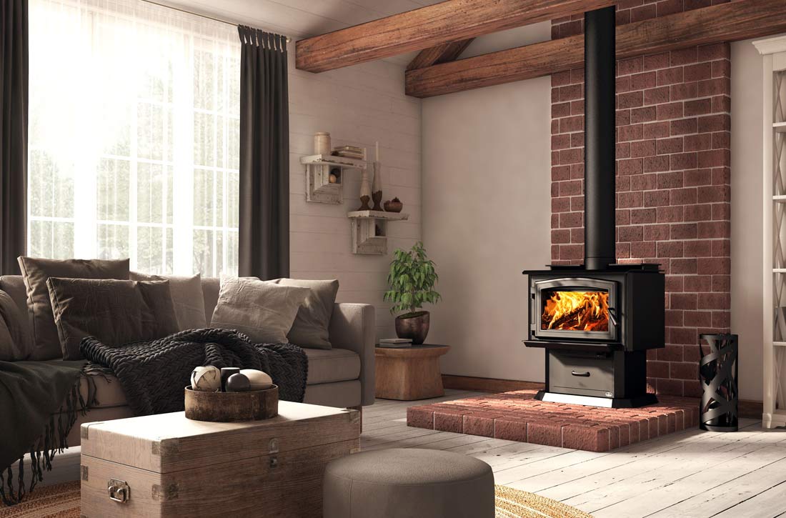 Osburn 1700 wood stove with black door and pedestal in living room