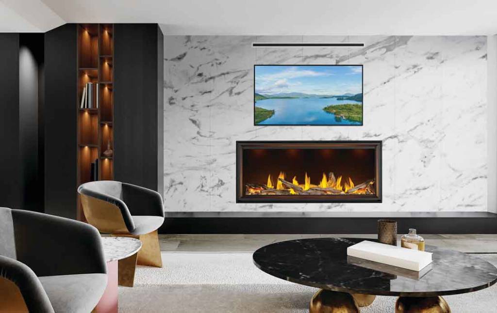Napoleon Tall Vector Linear 62 gas fireplace in living room with marble-look walls with television and ducted heat vent above.