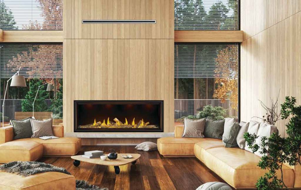 Napoleon Tall Vector Linear 74 gas fireplace on living room wall with ducted heat management duct near ceiling in vertical wood plank chase