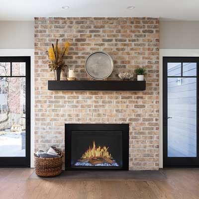 Modern Flames Orion traditional electric fireplace installed as an insert in an existing brick fireplace